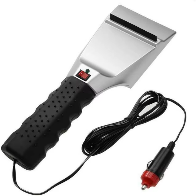 Heated snow shovel